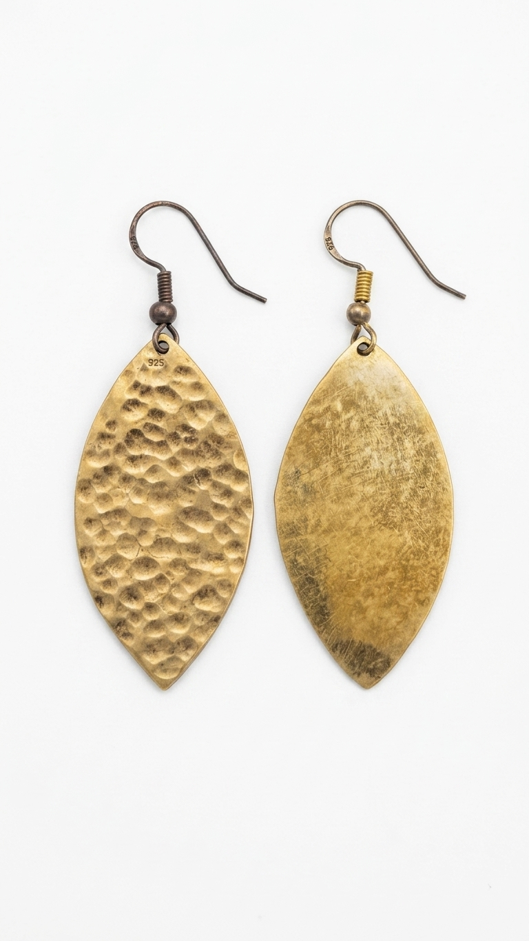 Petal Shield Brass Earrings, craft detail, handmade artisan jewelry from Tanzania